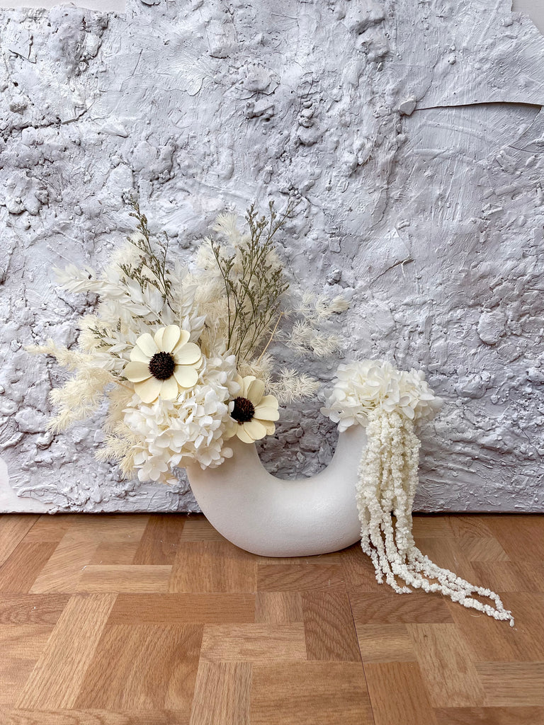 Designer bag vase with dried florals – Heera Baby NZ
